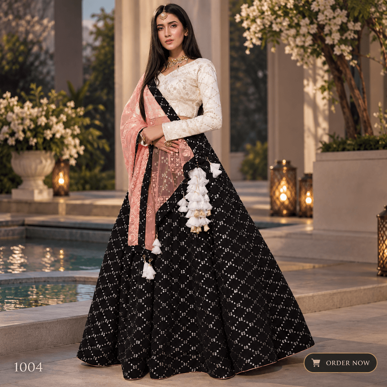 Elegant Black and Rose Lehenga Courtyard Portrait